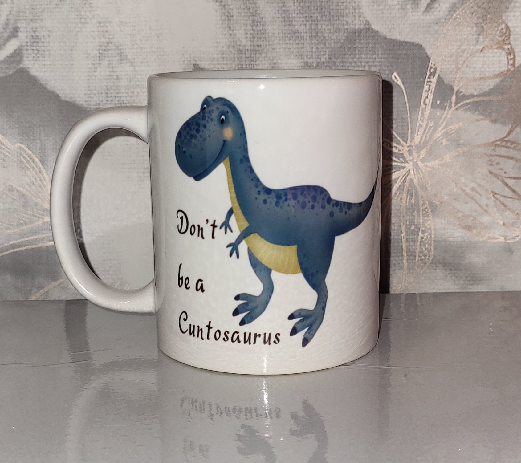 Don't Be A Cuntosaurus Mug